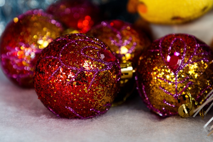 Red and gold glitter Christmas baubles