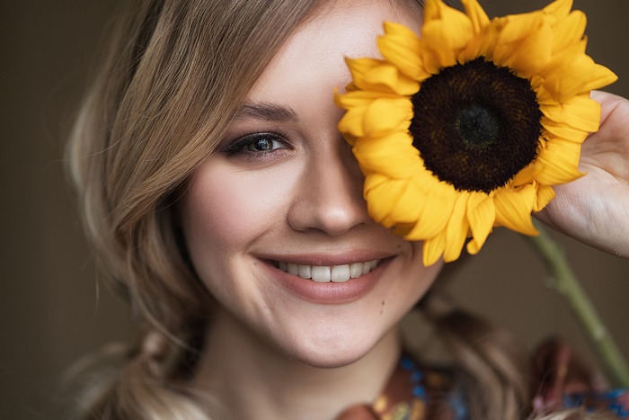 Ksenia Guseva with a Sunflower