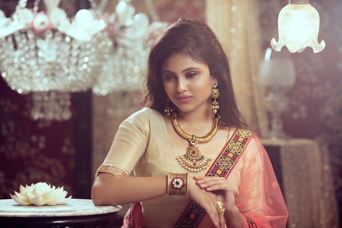 Indian Model Wearing Traditional Sari and Jewelry