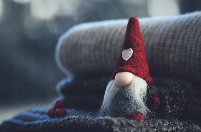 Gnome toy with red hat and white heart