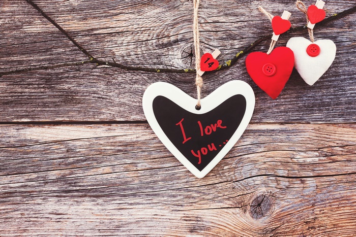 Heart shaped chalkboard with "I love you" message