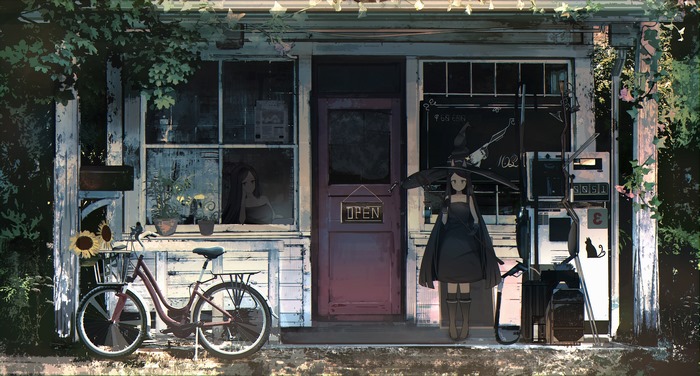 Girl in black dress with umbrella at gas station with bicycle