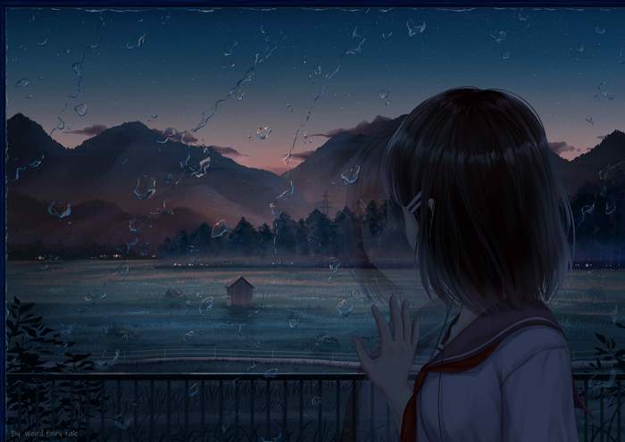 Girl looking out a window at night