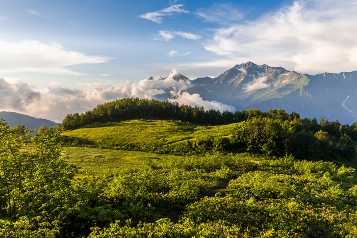 Mountain Landscape with Clouds and Green Hills