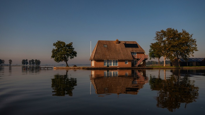 House on the water with reflections