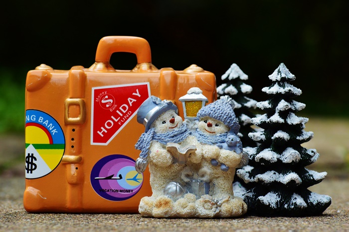Holiday Fund suitcase with snowmen and Christmas trees