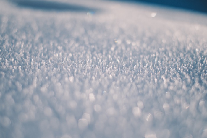 Close up of snow crystals with bokeh