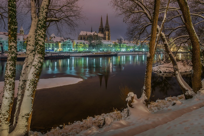 Winter scene of Regensburg, Bavaria, Germany with river and cathedral