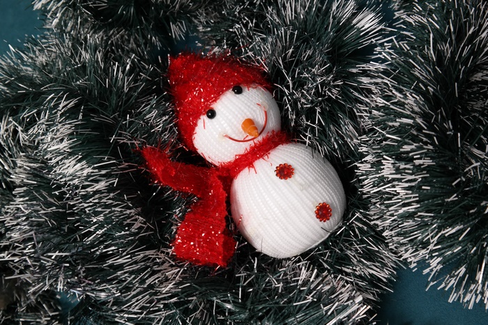 Christmas snowman decoration with tinsel