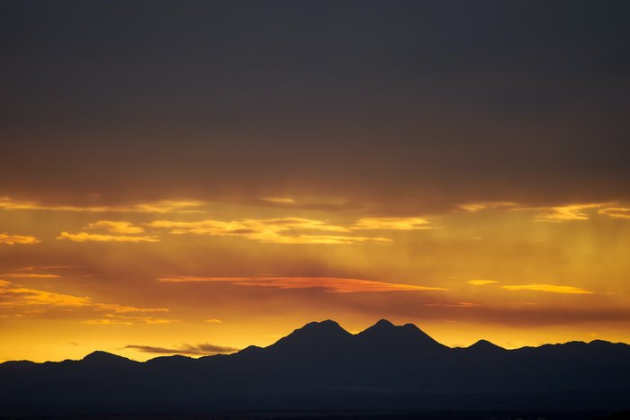 Silhouette of mountains during sunset