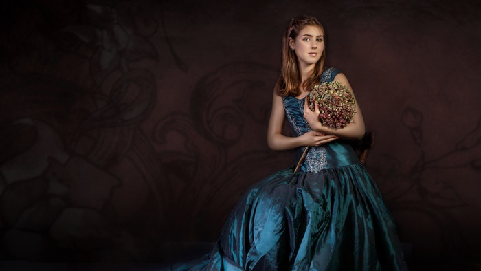 Elegant Woman in Blue Dress Holding Flowers 4K