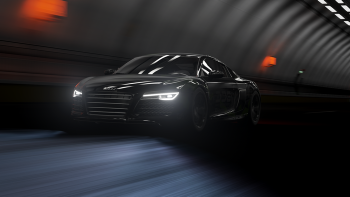 Black Audi R8 driving through a tunnel