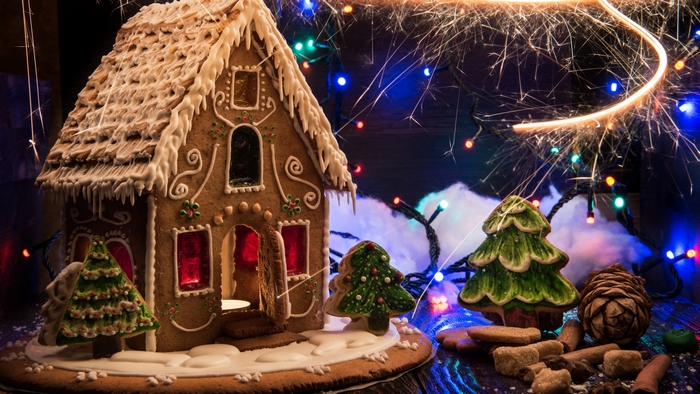 Gingerbread House with Christmas Decorations and Sparklers