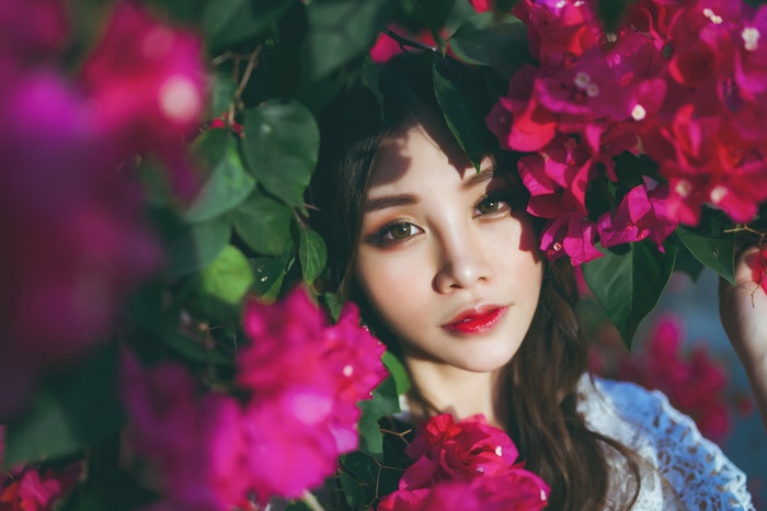 Asian woman with flowers
