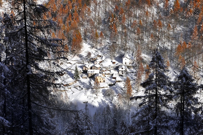 Snowy Italian Village in a Forest