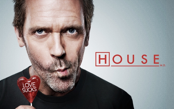 House M.D. with Hugh Laurie holding a lollipop