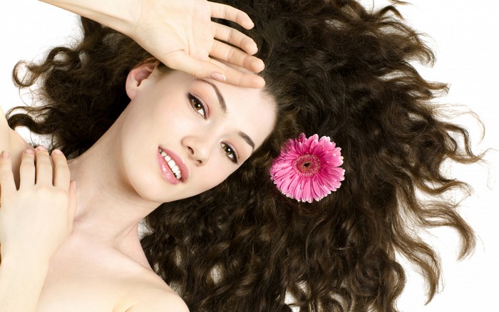 Model with Gerbera Flower in Hair