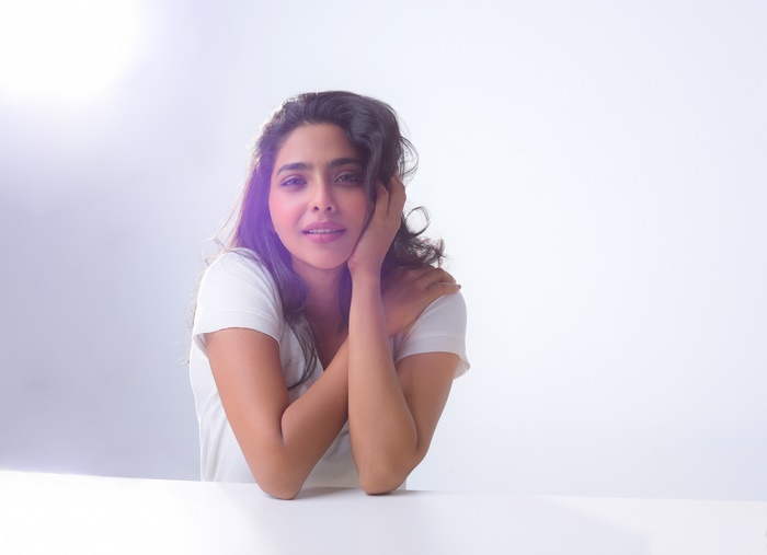 Aishwarya Lekshmi in a white t-shirt