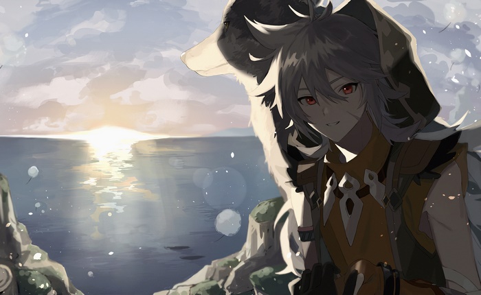 Razor and wolf by the sea at sunset