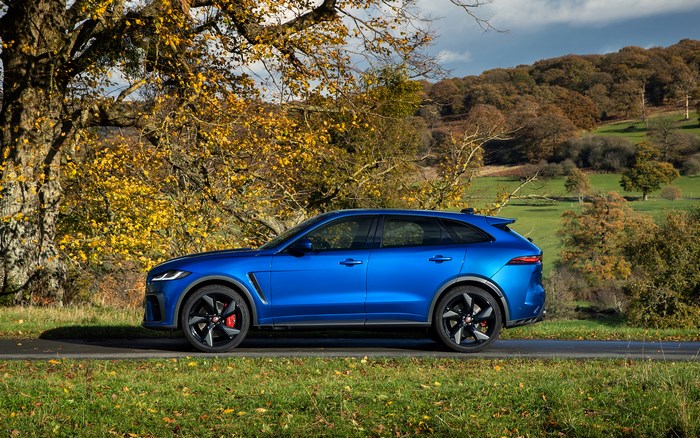 Blue Jaguar F-Pace SVR SUV in Autumn Landscape
