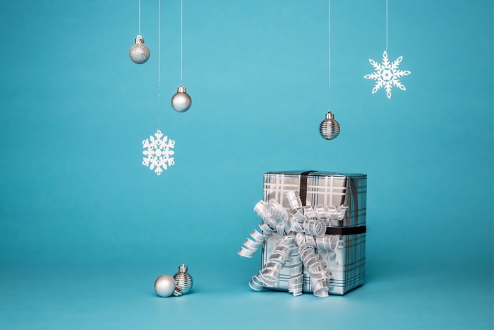 Christmas gift with ornaments and snowflakes