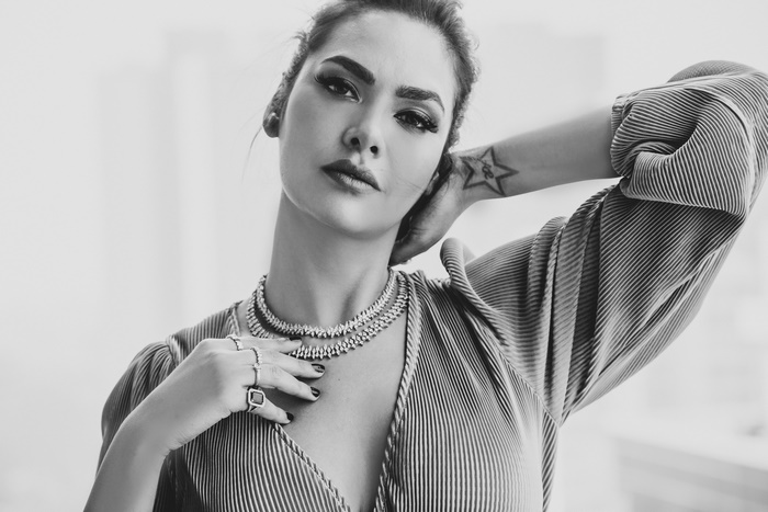 Esha Gupta posing with jewelry
