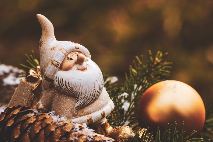 Christmas gnome with pine cone and ornament