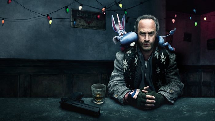 Christopher Meloni with a blue unicorn puppet in HAPPY! 4K