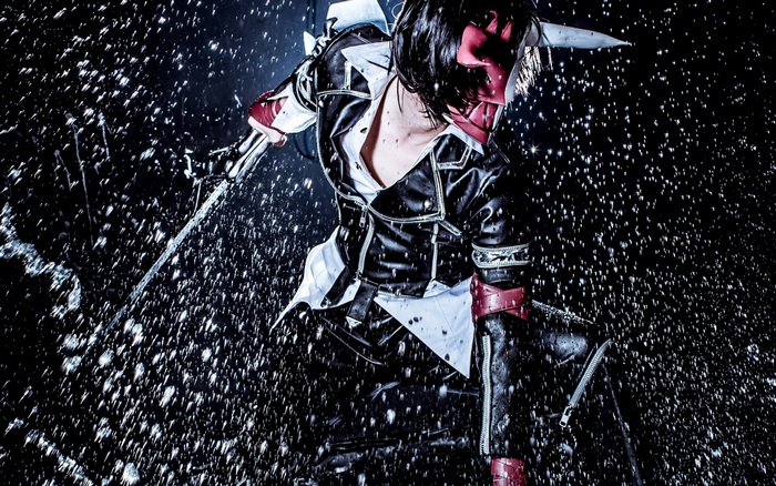 Cosplayer in HeroWarz costume with sword in water