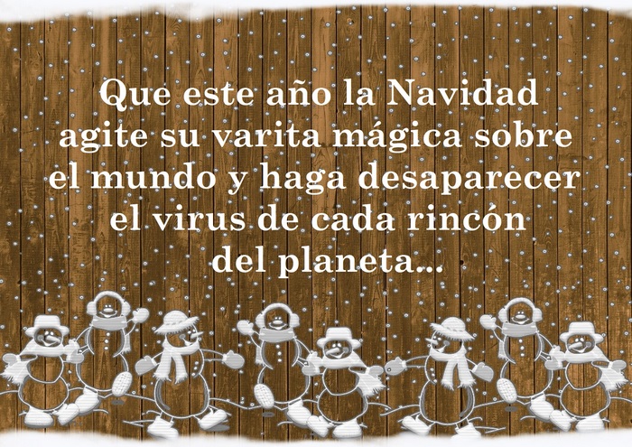 Christmas message with snowmen on wooden background