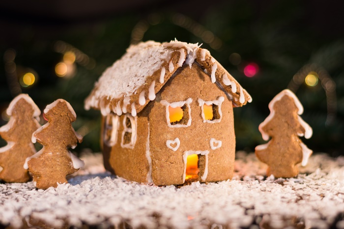 Gingerbread house with Christmas trees and lights