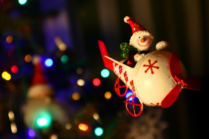 Christmas snowman ornament in an airplane