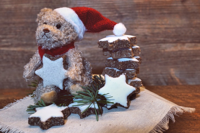Teddy bear with Santa hat and star cookies