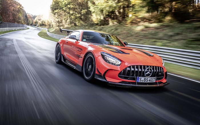Orange Mercedes-AMG GT 4K on a Race Track