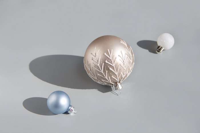 Christmas ornaments on a gray surface