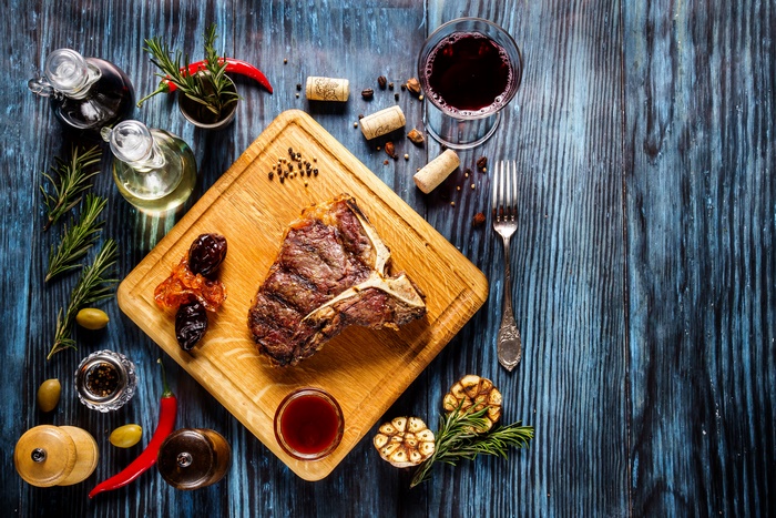 T-bone steak with wine and spices