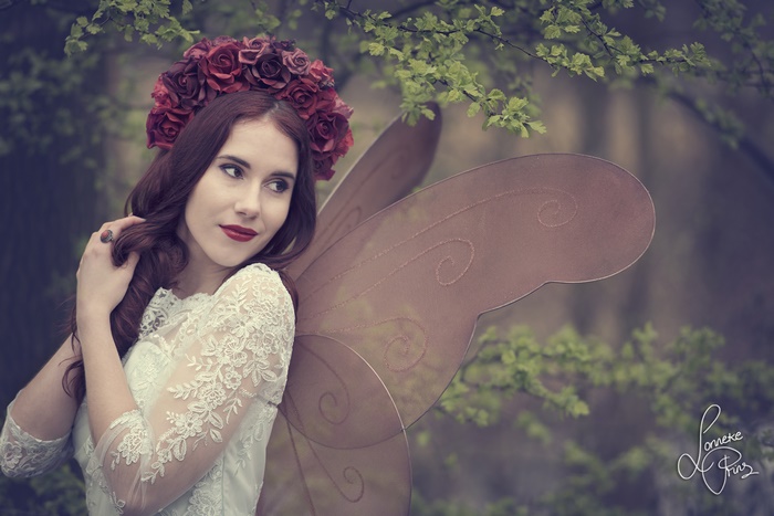 Woman with Rose Wreath and Fairy Wings