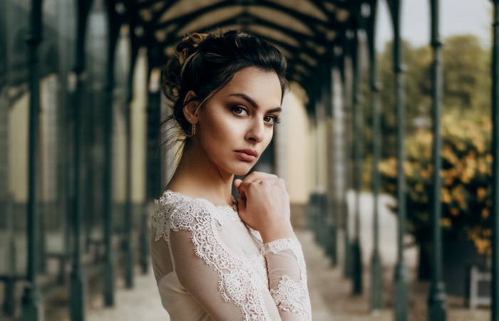 Woman in white lace dress
