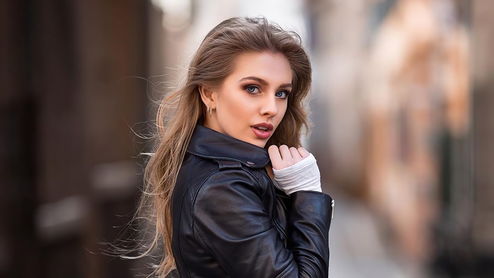 Alexa Breit wearing a black leather jacket