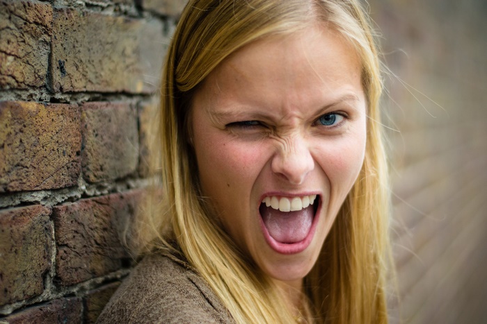 Blonde woman making a face