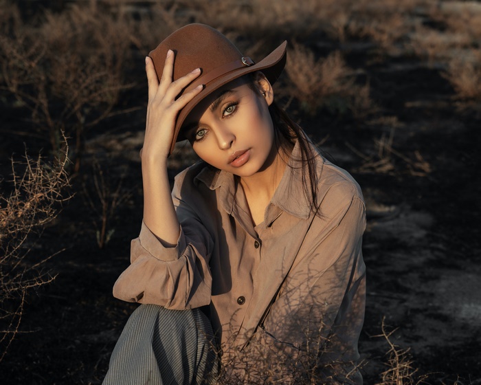 Elegant Woman in Brown Hat