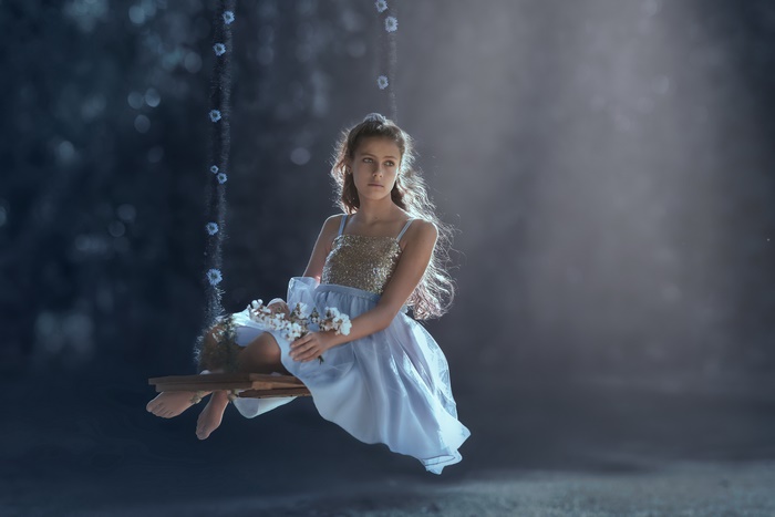 Girl on a Swing in a Dreamy Mood