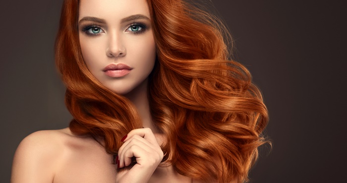 Portrait of Red-Haired Model with Blue Eyes