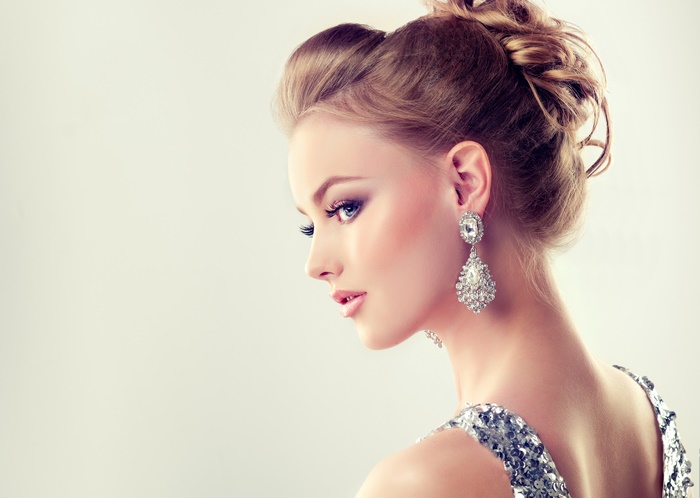 Elegant Model with Makeup and Earrings in 4K