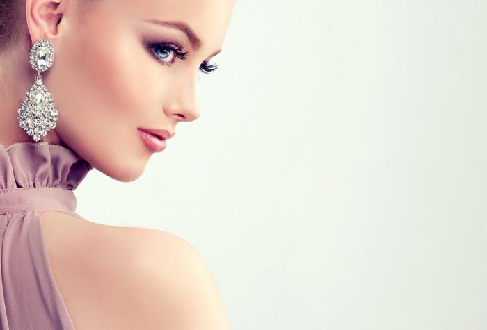 Elegant Woman Portrait with Diamond Earrings
