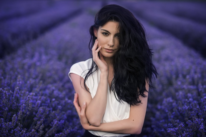 Woman with black hair in a lavender field