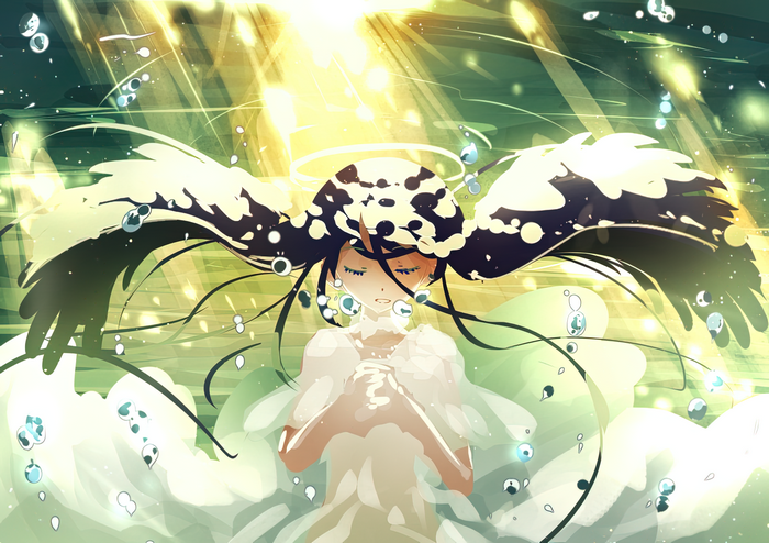 Girl with wings and halo in light
