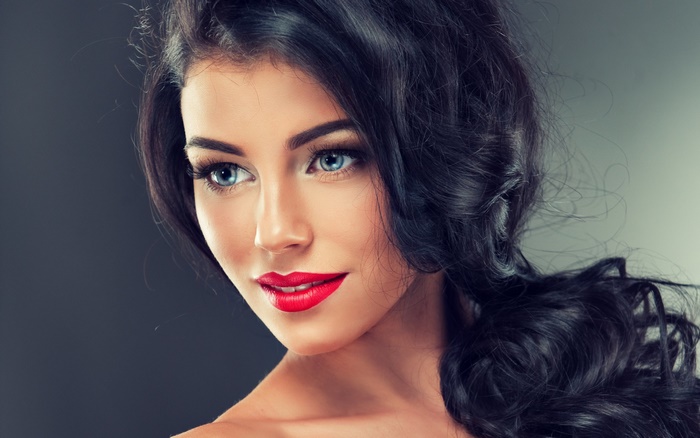 Brunette Model with Makeup and Red Lipstick
