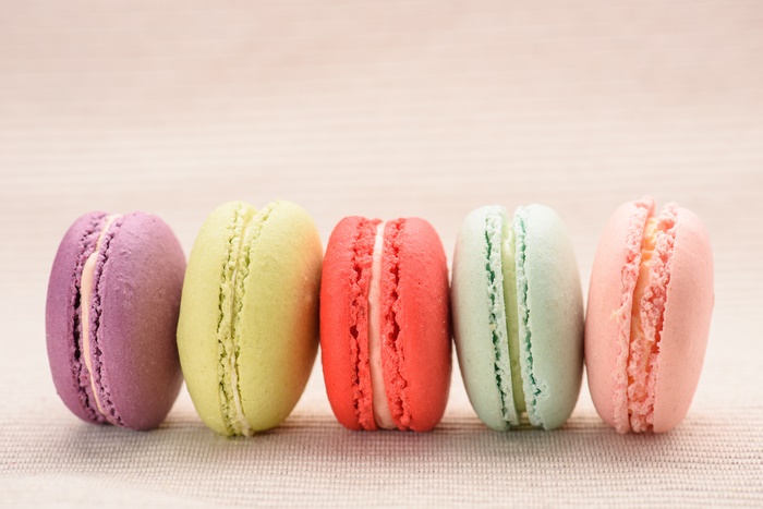 Five colorful macarons in a row