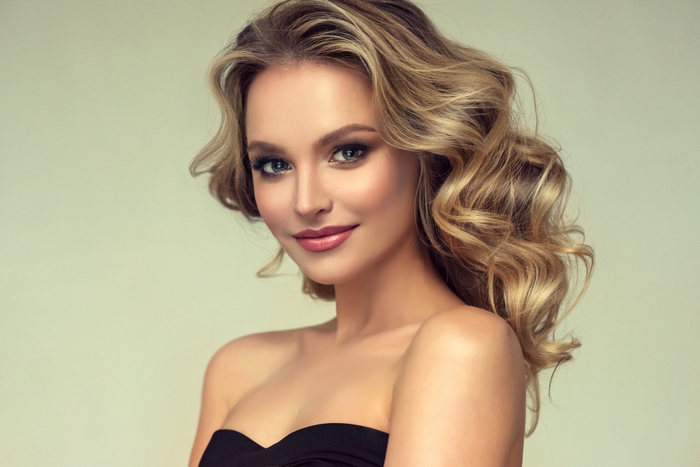 Beautiful Model Portrait with Glamorous Hair and Makeup